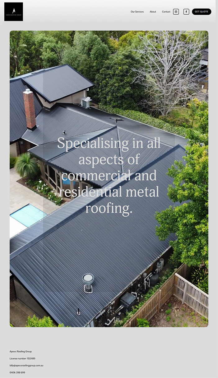 Aerial view of metal roofing with greenery, highlighting commercial and residential roofing specialization.
