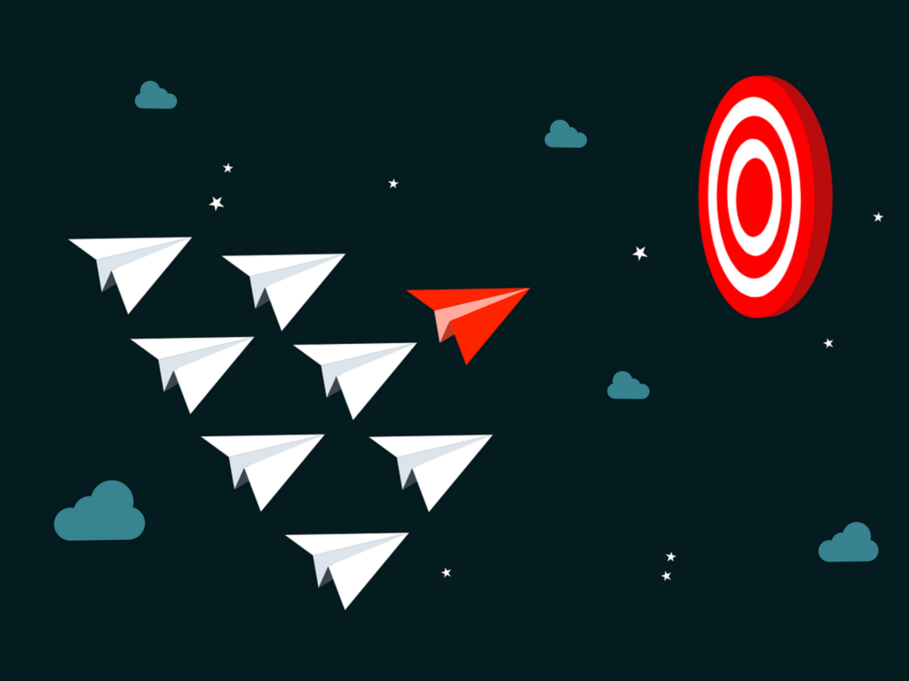 Red paper plane leads white planes toward a target, symbolizing leadership and direction in a dark sky with clouds and stars.